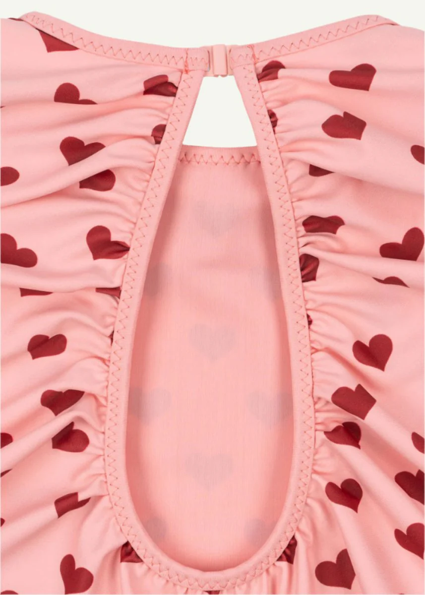 Konges Sloejd | Manuca Long Sleeved Swimsuit in Amour Pink: UPF 50+ Heart Pattern Protection - Image 3