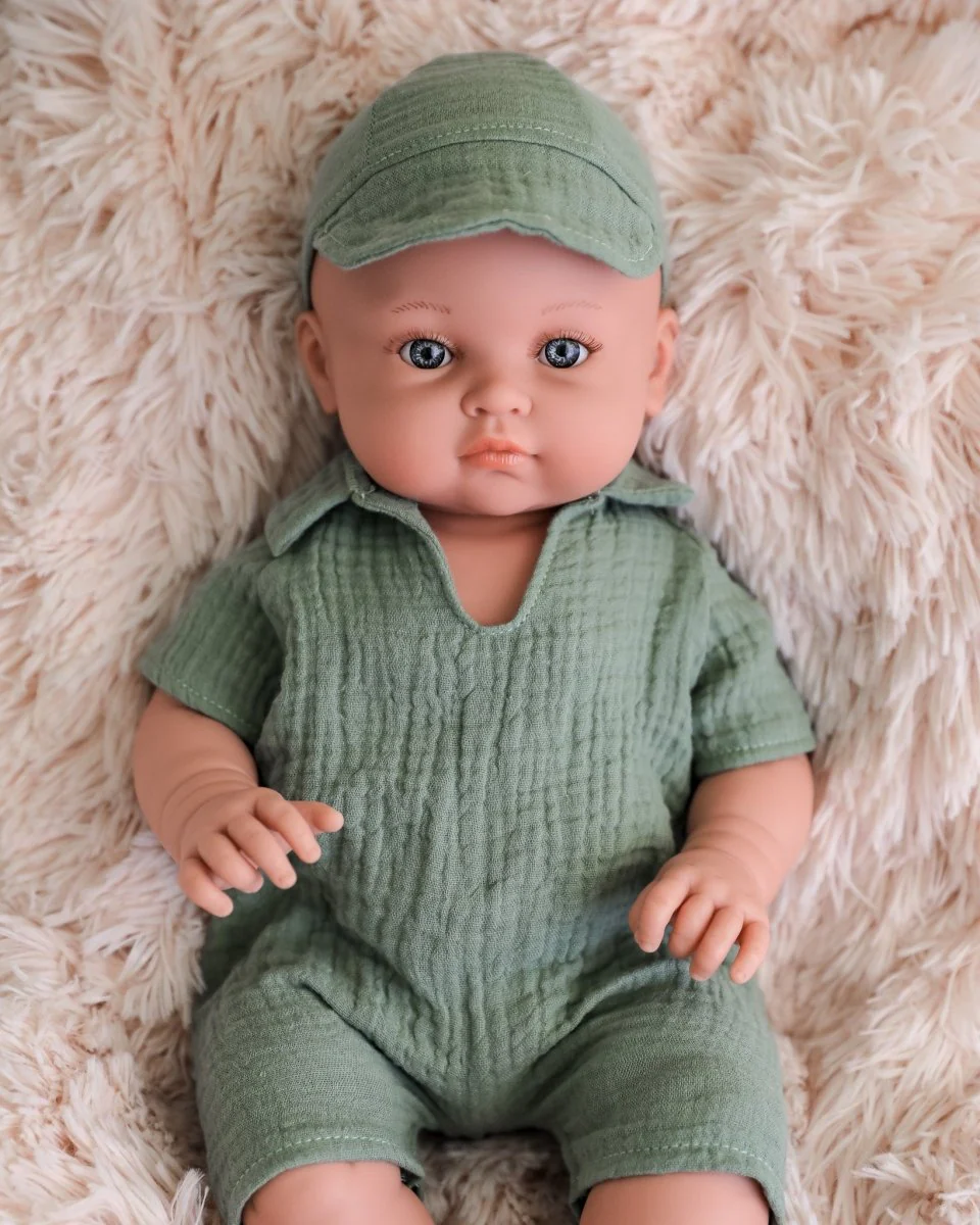 Minikane Doll | 18" Bambini Boy Doll Yann in Green Outfit - Image 2