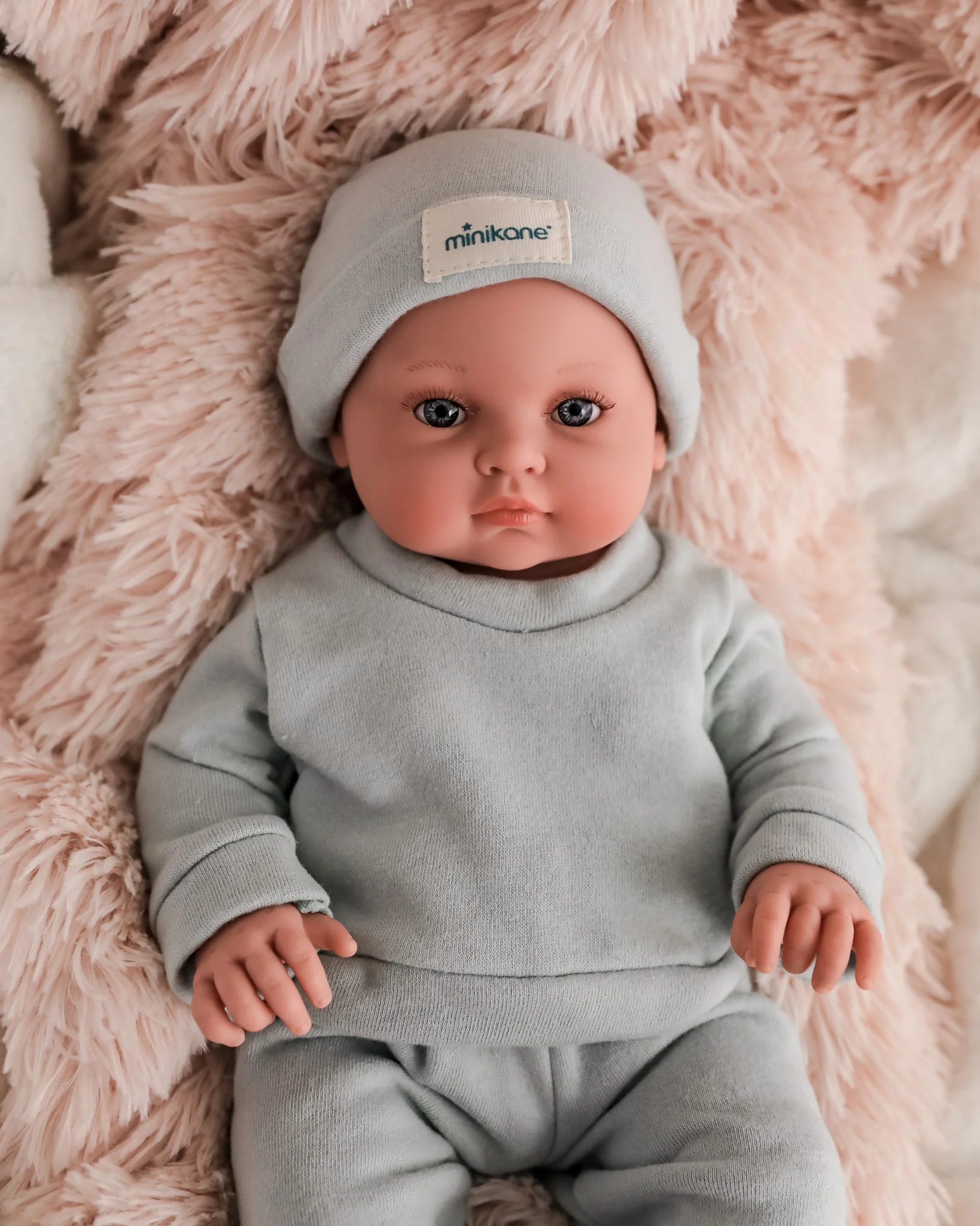 Minikane Doll | 18" Bambini Boy Doll Yann in Green Tea Fleece Outfit - Image 2